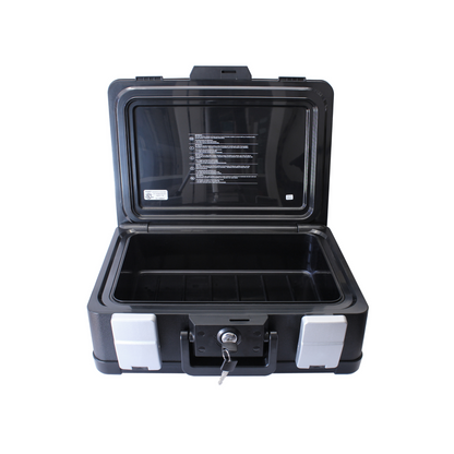 Open Cathedral Products DSBA4 UL Certified lockable A4 fire and waterproof security chest. The interior is empty, showing the spacious compartment, and the lid has a list of instructions. A key is inserted in the lock, ready to secure valuable documents or items.