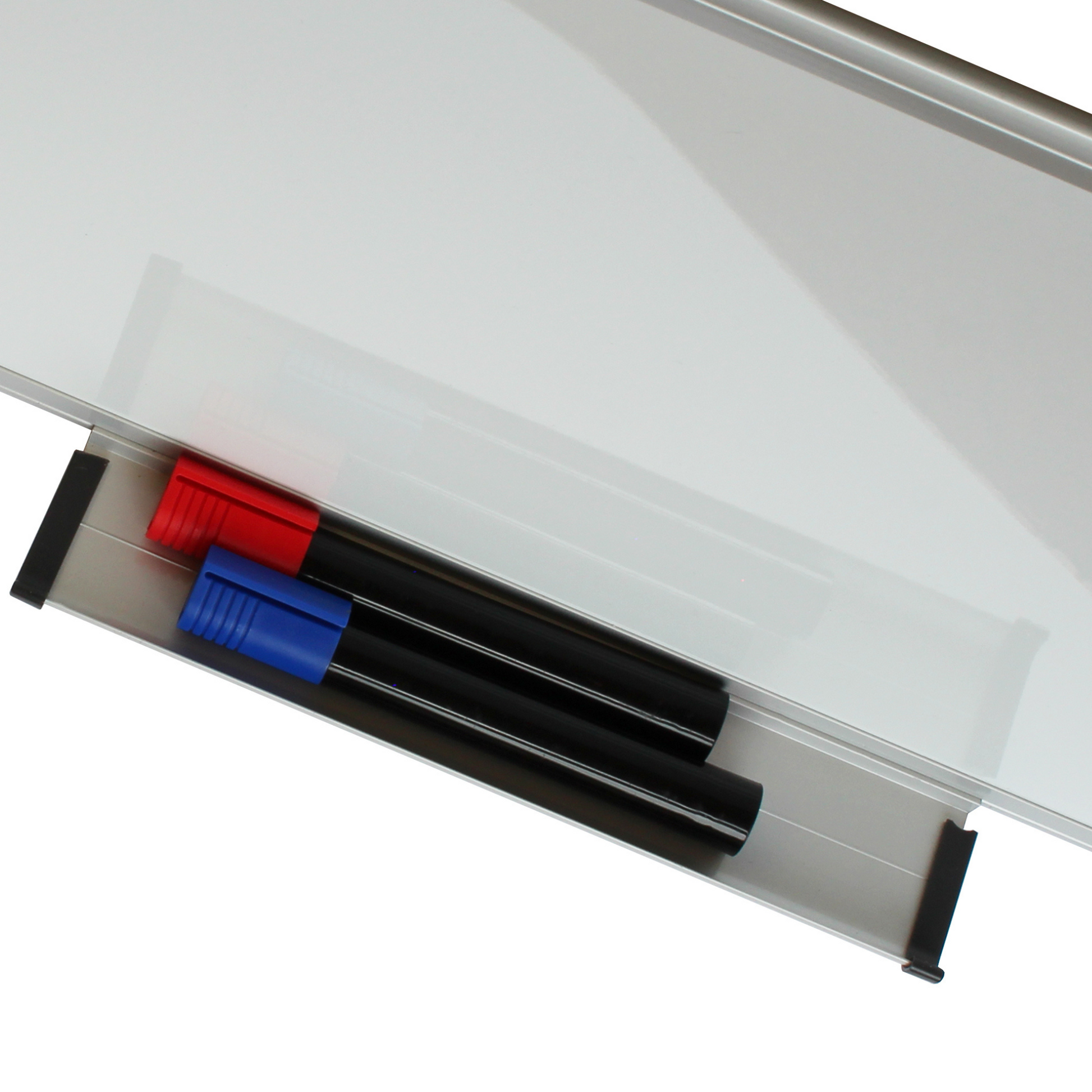 Whiteboard marker tray holding two markers with caps on, coloured red and blue (not included), against a white magnetic board with a metallic frame.