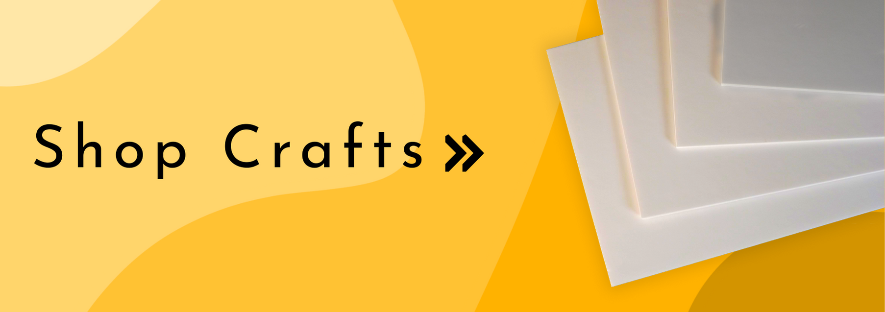 Image for the Crafts category, featuring a stack of white foamboard on a dual-tone yellow background, with the text 'Shop Crafts >>' in bold, dark font.
