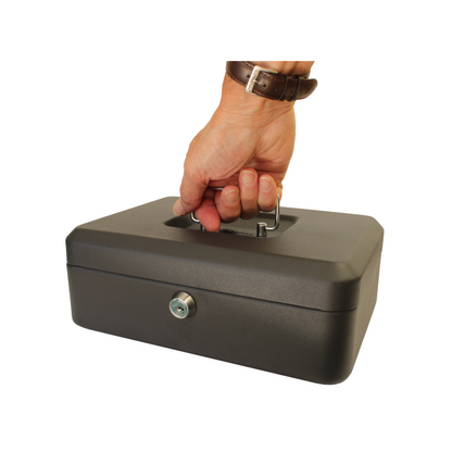 A hand lifting a 10-Inch key lockable black cash box by the handle, showing the size comparison between a hand and the size of the box.