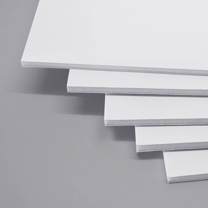 Stack of white 5mm thick A2 size foam boards, measuring 420 x 594mm, neatly arranged in a pack of 20 on a white background, highlighting the layered foam core structure.