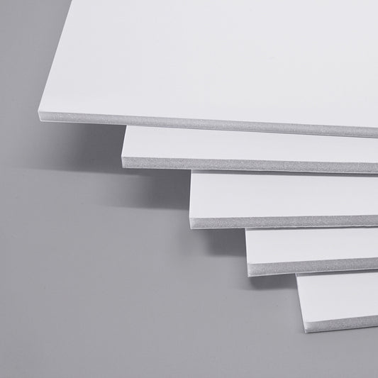 Stack of white 5mm thick A3 size foam boards, measuring 297 x 420mm, neatly arranged in a pack of 10 on a white background, highlighting the layered foam core structure.
