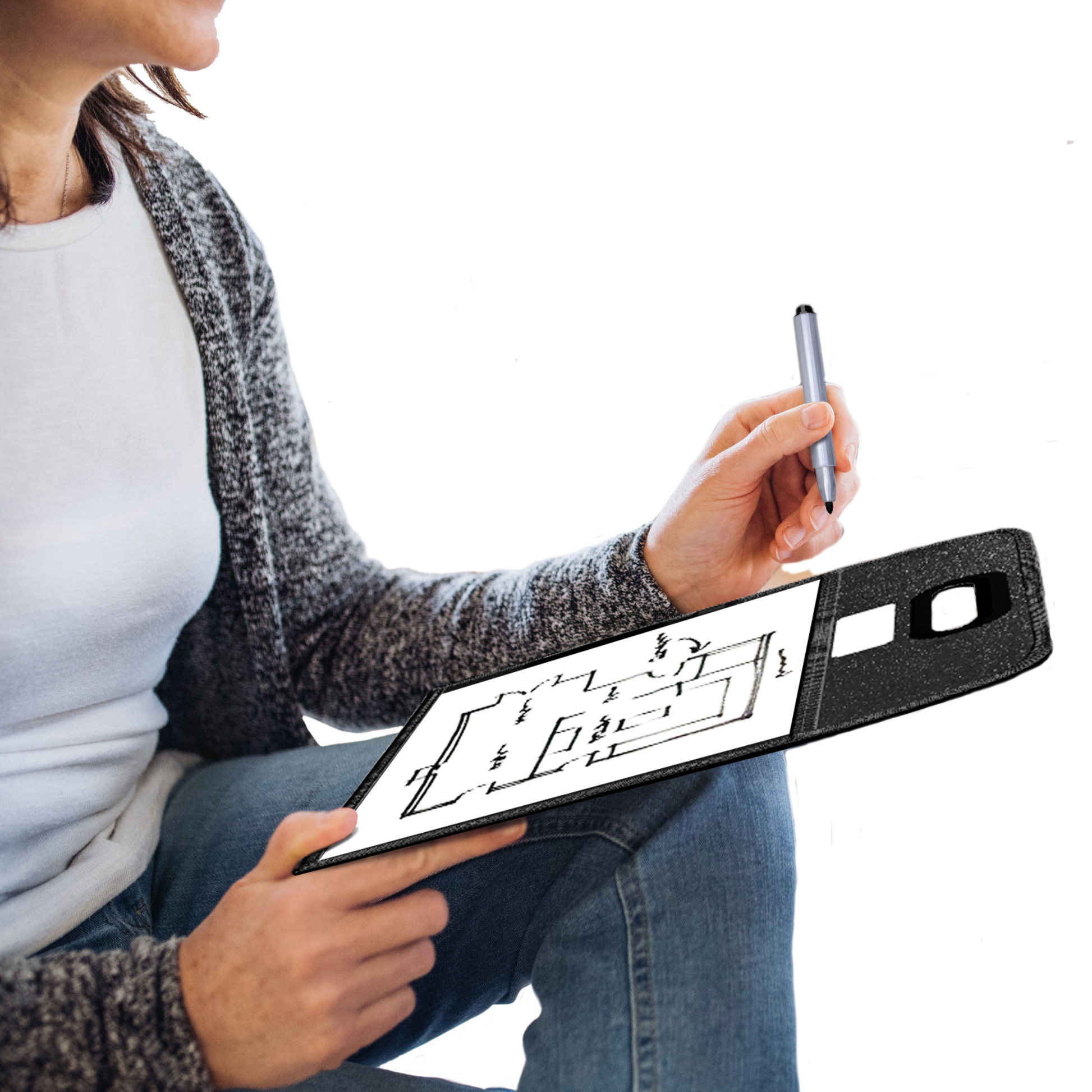 Person sitting cross-legged, holding a dry-erase pad with handle and writing with a marker. The pad shows a drawn flowchart, illustrating the use of the pad for organizing thoughts or planning.